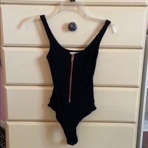 Zip up black body suit
